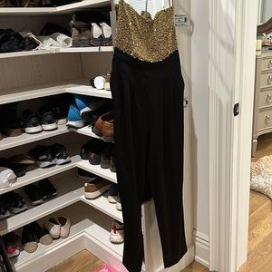 Brand new with tags alice and Olivia jumpsuit. Beaded strapless top and pants.